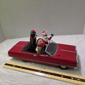 The Gemmy Animated Musical Low Rider Red Impala Car Featuring Santa And Friends